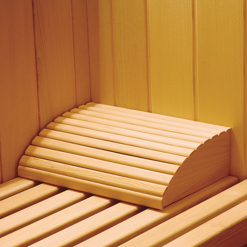 Ergonomic abachi wood headrest for sauna.