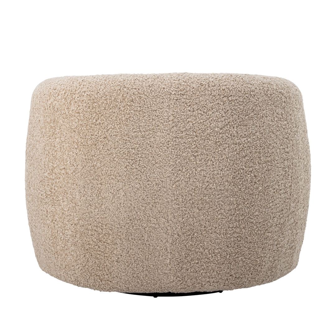 Bloomingville Bocca beige snurrfåtölj sedd bakifrån med helt klädd rundad rygg