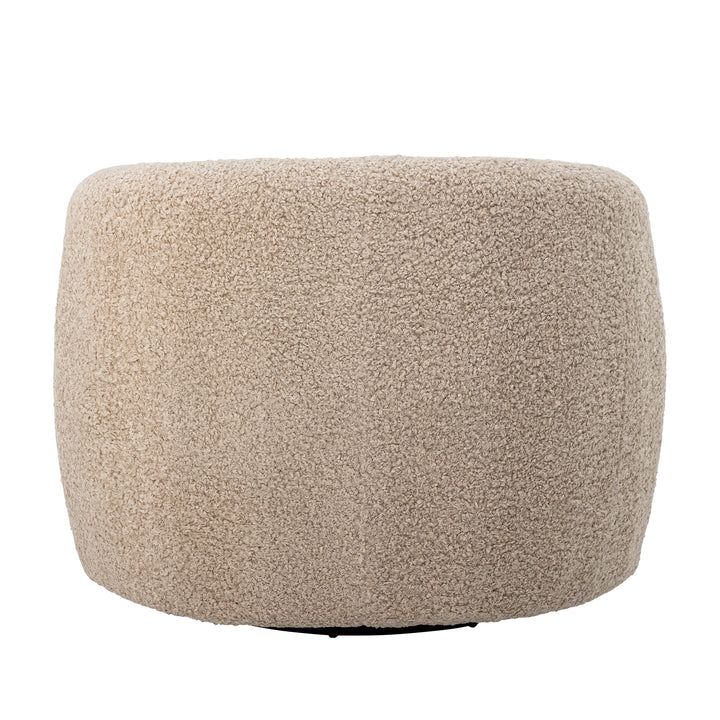 Bloomingville Bocca beige snurrfåtölj sedd bakifrån med helt klädd rundad rygg
