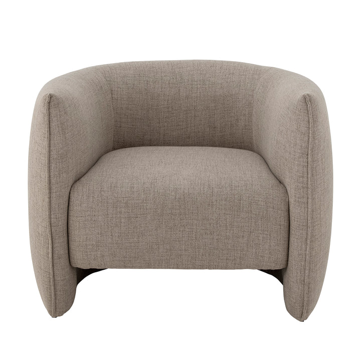 Bloomingville Bacio ljusbeige loungefåtölj med välvd rygg och indragen bas, framifrån