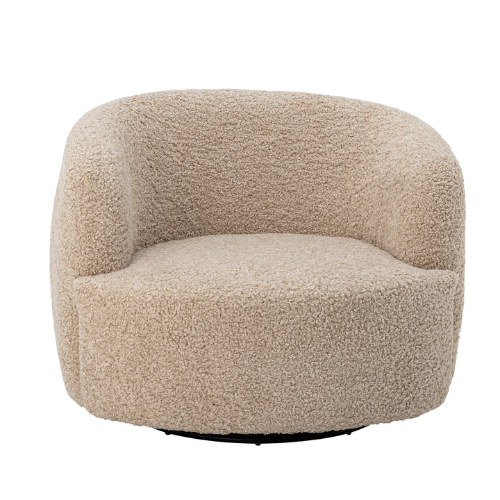 Bloomingville Bocca beige snurrfåtölj med rundad rygg och strukturerad polyester, framifrån