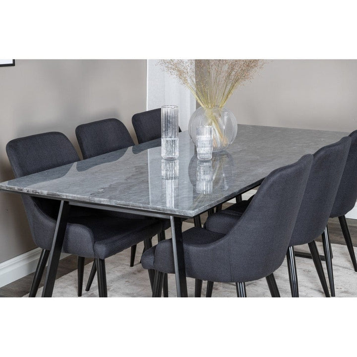 Venture Home Plaza Dining svart – klädd sits och smal metallbenställning