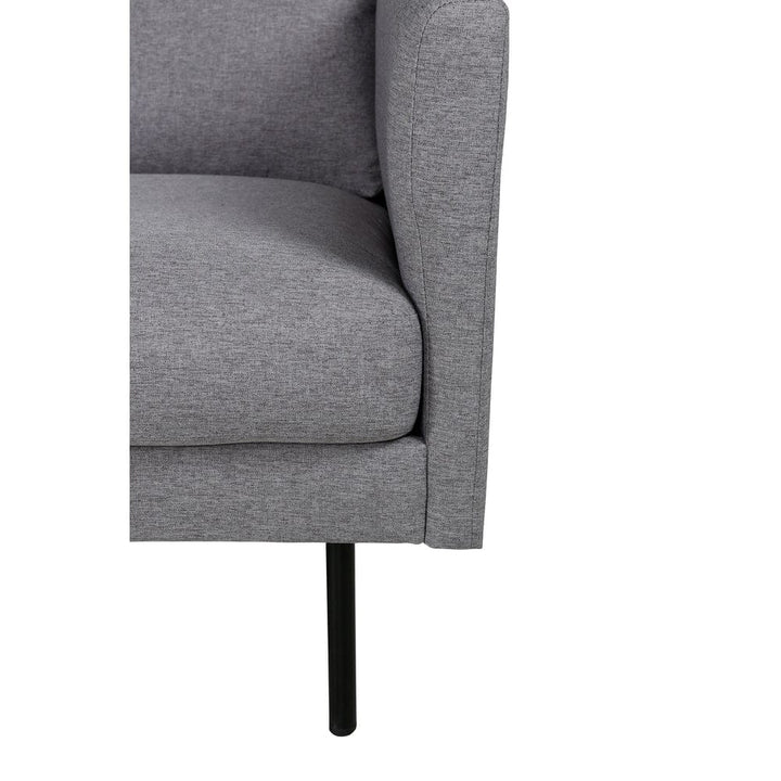 Närbild av Zoom grå sits, armstöd och svart metallben