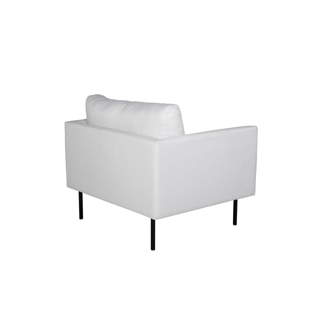 Zoom ljusbeige fåtölj snett bakifrån med klädd rygg